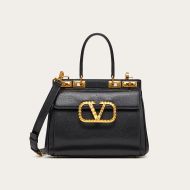 Valentino Garavani Medium Rockstud Handbag In Grainy Calfskin Black