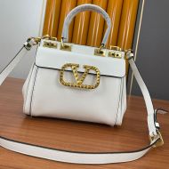 Valentino Garavani Medium Rockstud Handbag In Grainy Calfskin White